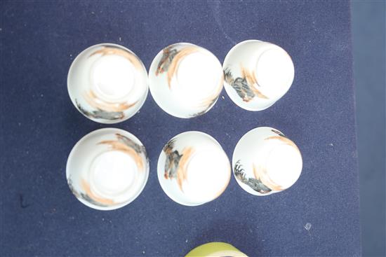 A set of six Chinese rouge de fer chicken tea bowls and five saucers, 18th / 19th century, saucers 11.5cm, minor damage